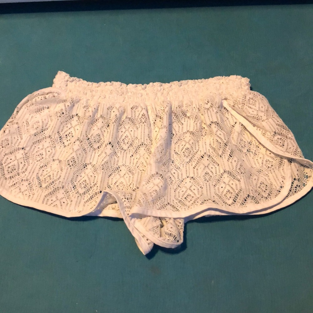 white swim cover shorts